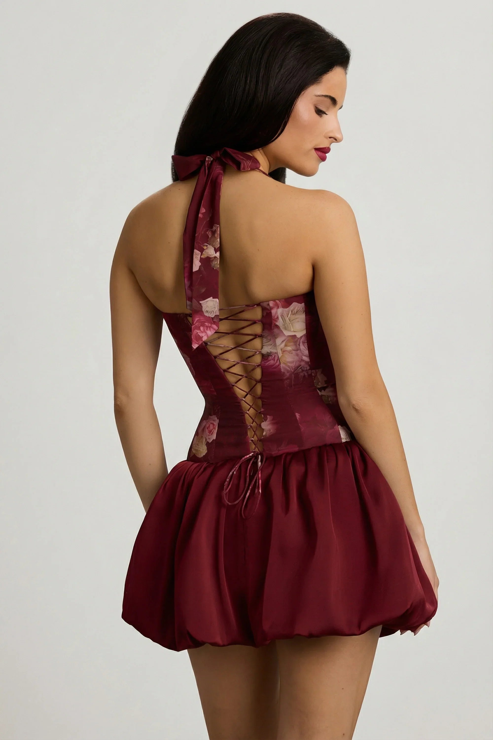 Halterneck Lace-Up Bubble Hem Mini Dress in Maroon Floral Print