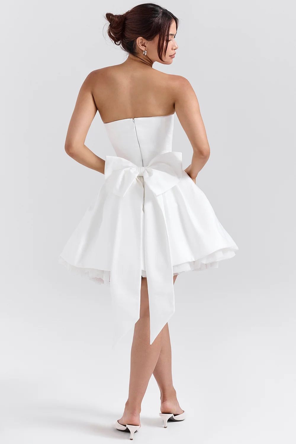 white satin strapless bow mini gown